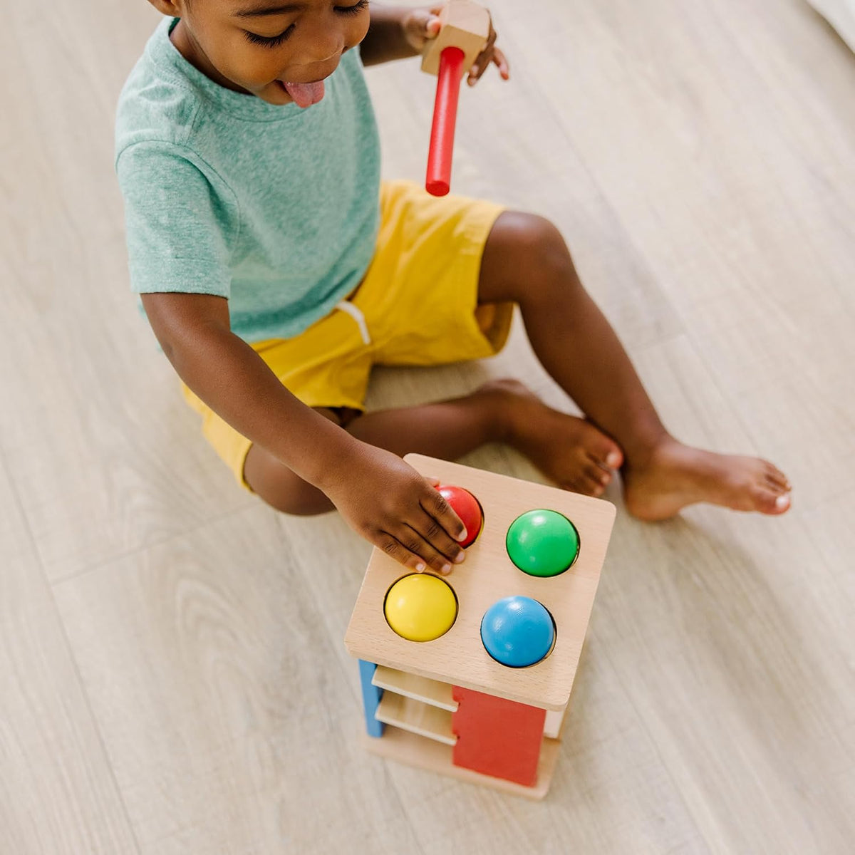 Melissa & Doug Deluxe Pound and Roll Wooden Tower Toy with Hammer, White